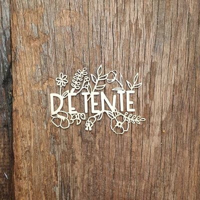 Carton-bois-mot-détente-entouré-de-fleur